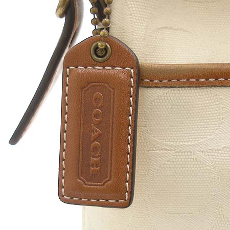 Coach(��ġ) �ñ׳�ó �ڰ��� �����̵� ���� ��Ƽġ ũ�ν��� �̹���2 - ���̺��� �߰���ǰ